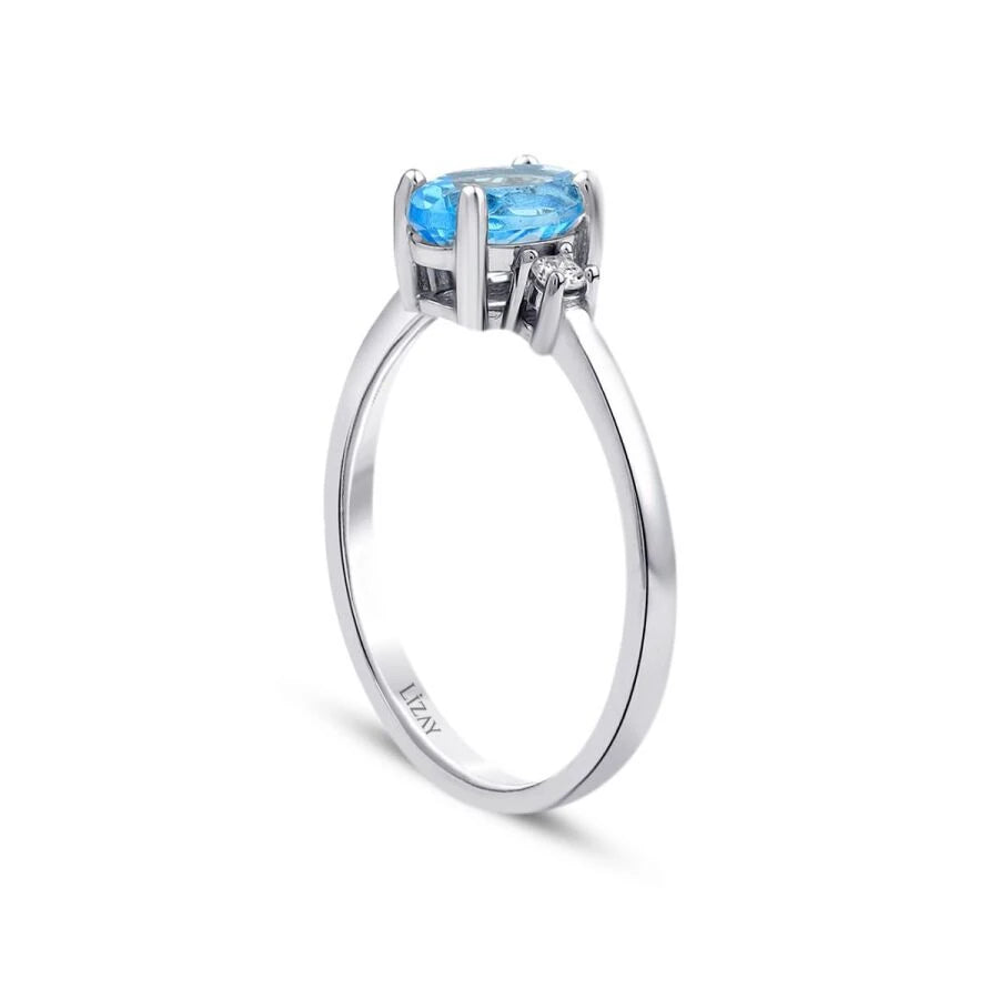 Ring mit 1,07 Karat Diamant und blauem Topas