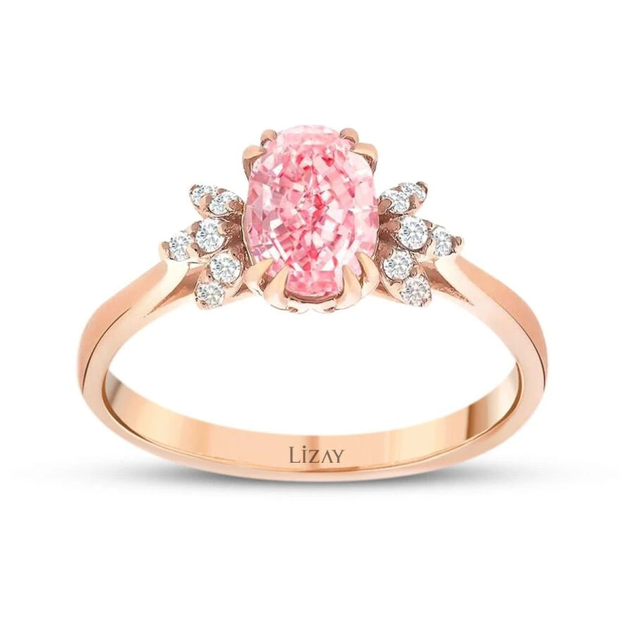 Ring mit 0,77 Karat Diamant und farbigem Stein