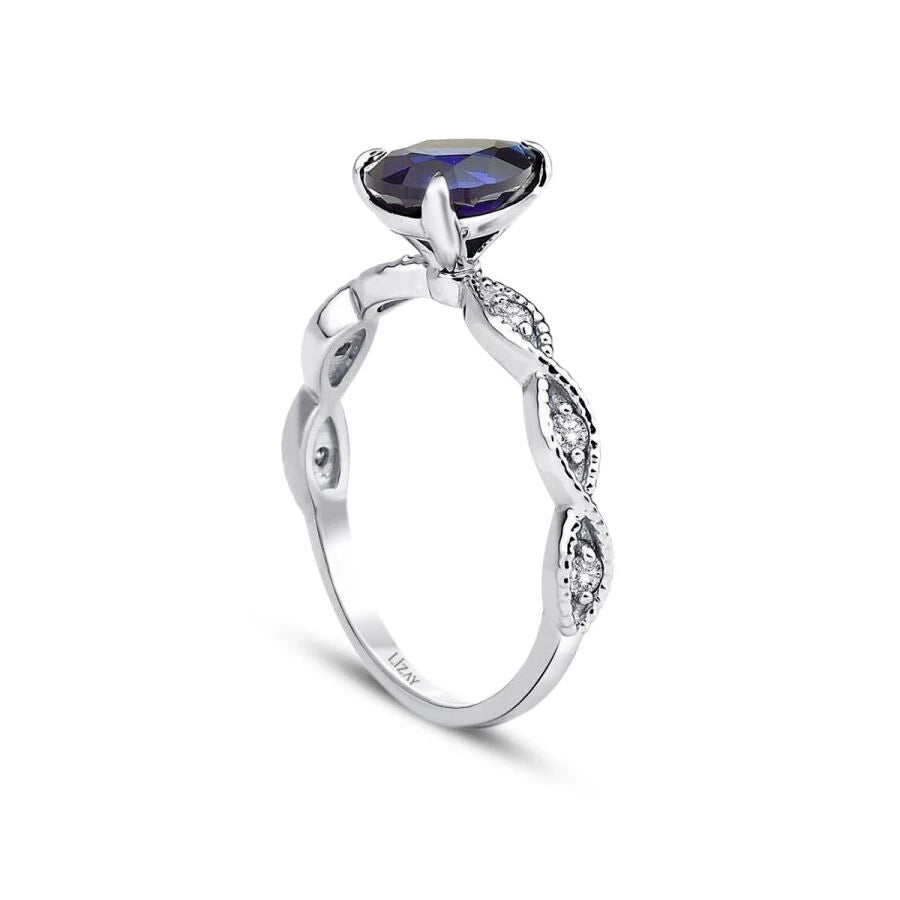 1,45 Karat Diamant-Birnen-Saphir-Ring