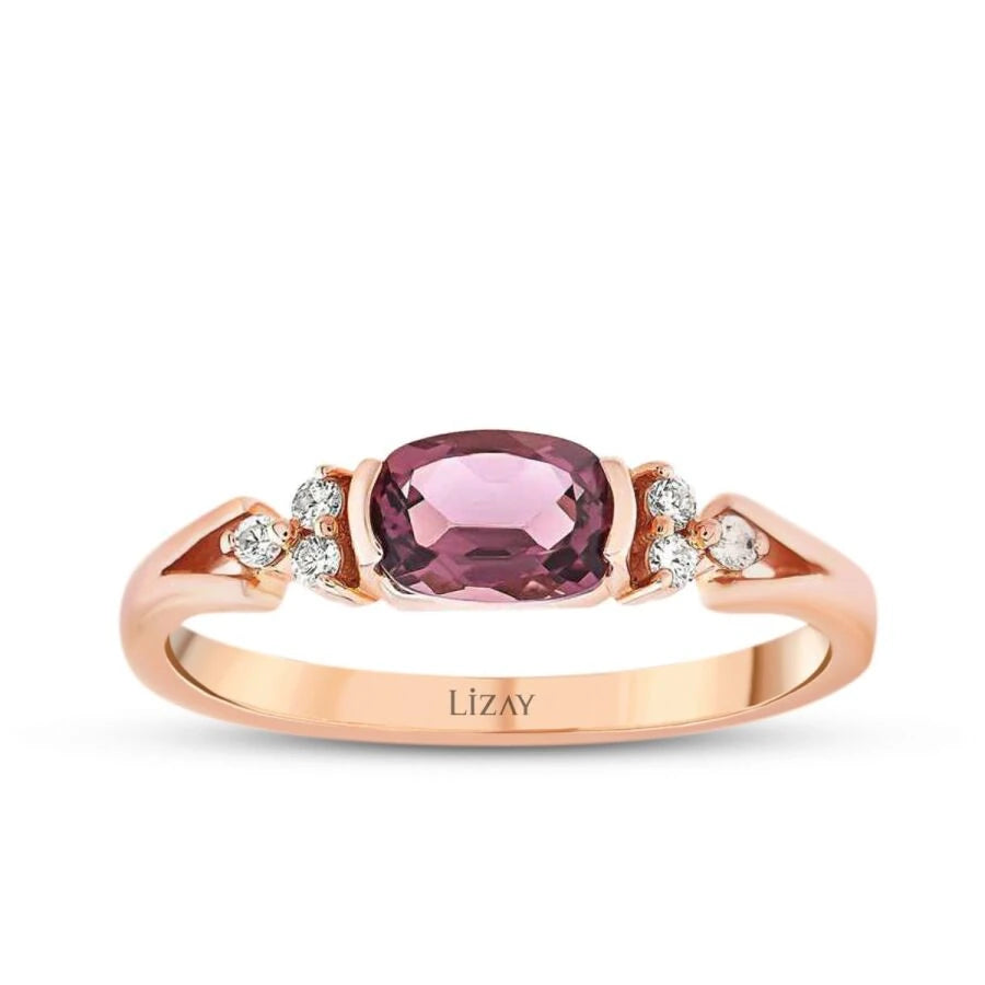 Ring mit 0,61 Karat Diamant und farbigem Stein