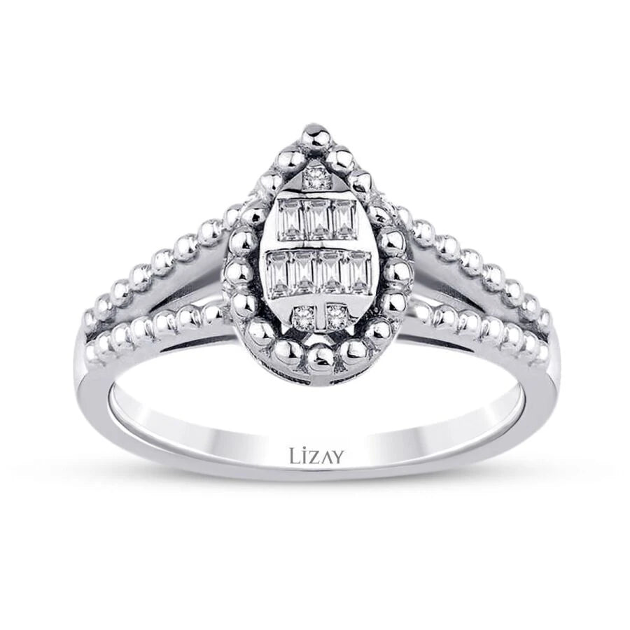 0.12 Carat Diamond Pear Baguette Ring