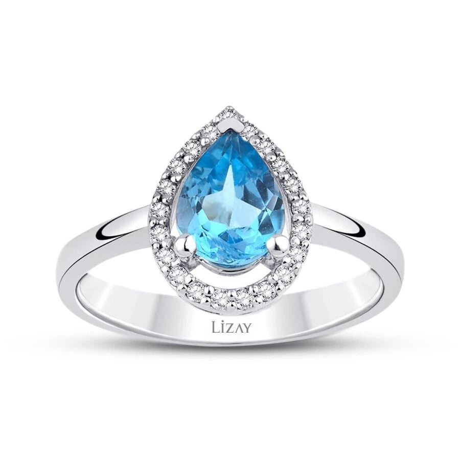 Ring mit 1,27 Karat Diamant und blauem Topas